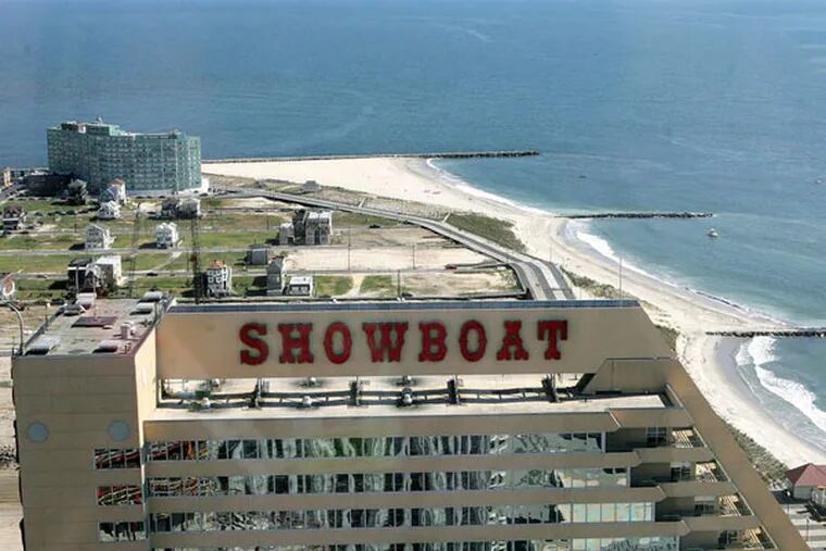 Billionaire buyout (private-equity) artists are shuttering Showboat casino-hotel and ending 2,000 jobs. (Mel Evans / AP)