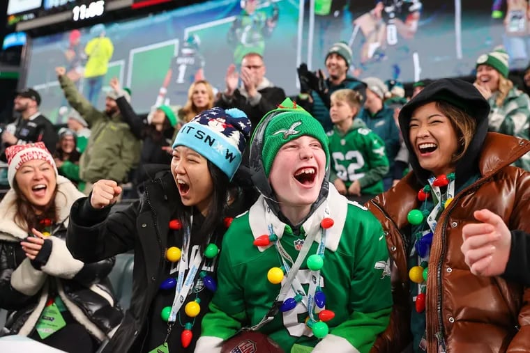 Eagles fans celebrate during their team's Christmas Day win over the Giants back in December.