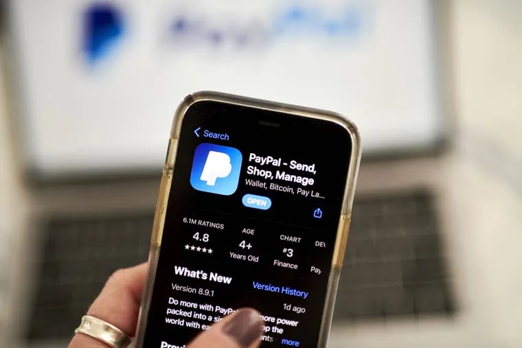 The PayPal application in the Apple App Store on a smartphone. Bloomberg photo by Gabby Jones.