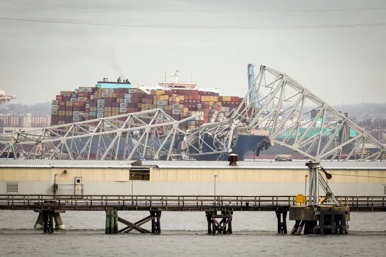The Francis Scott Key Bridge collapsed after a container ship ran into it on the Patapsco River in Baltimore, Maryland on Tuesday, March 26, 2024.