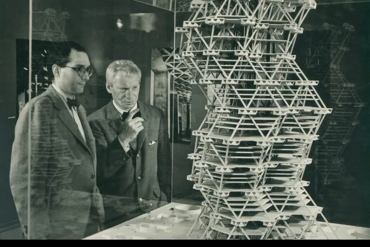 Louis Kahn examines a model of City Tower, a skyscraper proposed for Center City but never built.