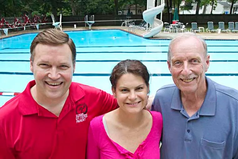 Board of director member Dan Thompson, board president Maureen Behm and meet organizer Bob Rueppel at the Old Orchard Swim Club, Cherry Hill, June 3, 2014.  ( DAVID M WARREN / Staff Photographer )