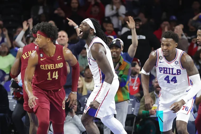 Montrezl Harrell, center, of the Sixers celebrates after making the game-winning shot the Cavaliers during their preseason game at the Wells Fargo Center on Oct. 5, 2022.