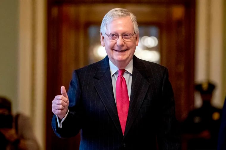 Senate Majority Leader Mitch McConnell (R., Ky.) gives a thumbs-up as he leaves the Senate chamber on Capitol Hill in Washington last month after a deal had been reached on a coronavirus bill.