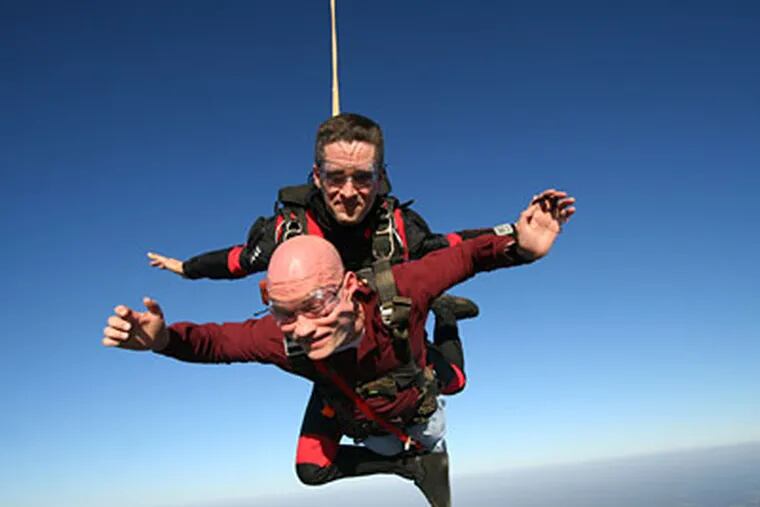 Fred Schwartz (below), who has MS, skydives with Peter Rovnan. "I want to inspire people with disabilities," says Schwartz, who raised $2,500 with this jump. (Credit: David Pancake)