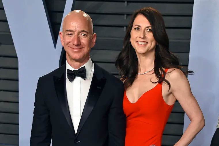 In this March 4, 2018 file photo, Amazon founder Jeff Bezos and then wife MacKenzie Bezos arrive at the Vanity Fair Oscar Party in Beverly Hills, Calif. Now Mackenzie Scott, she has given away more than $4 billion to organizations and colleges in the last four months.