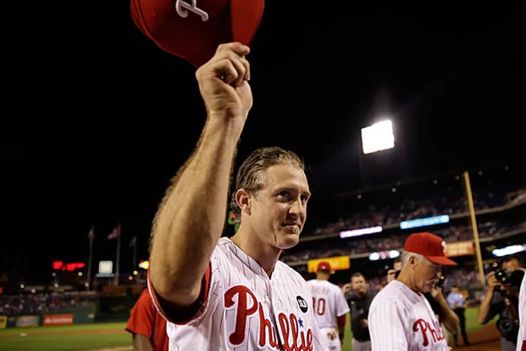Chase Utley acknowledges cheers from the crowd after Wednesday night's game.