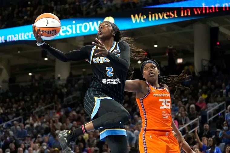 Kahleah Copper (left) and Jonquel Jones are just two players with local ties in the WNBA playoffs.