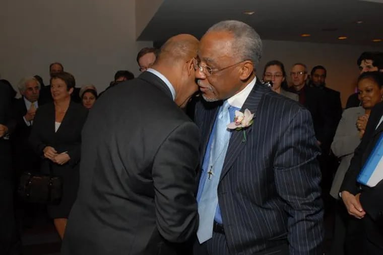 Mayor Nutter embraces former mayor W. Wilson Goode Sr. Both were honored as Literacy Champions at the Center for Literacy&#0039;s Reading Writers gala.
