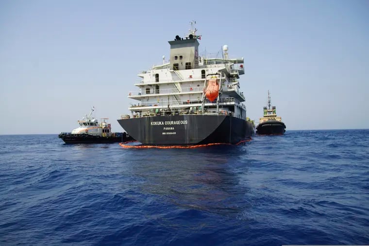 The Panama-flagged, Japanese owned oil tanker Kokuka Courageous, that the U.S. Navy says was damaged by a limpet mine, is anchored off Fujairah, United Arab Emirates, during a trip organized by the Navy for journalists, Wednesday, June 19, 2019. The limpet mines used to attack the oil tanker near the Strait of Hormuz bore "a striking resemblance" to similar mines displayed by Iran, a U.S. Navy explosives expert said Wednesday. Iran has denied being involved.