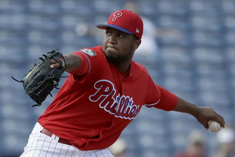 Phillies prospect Elniery Garcia , here pitching during spring training, has started two games since his suspension ended.