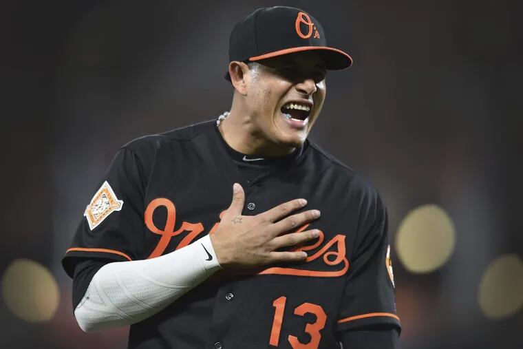 Manny Machado reacting to something from the bench of the Tampa Bay Rays before a game, last September.