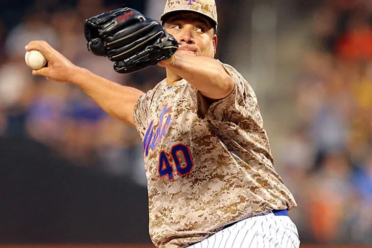 New York Mets starting pitcher Bartolo Colon (40) pitches against the Philadelphia Phillies during the second inning at Citi Field.
