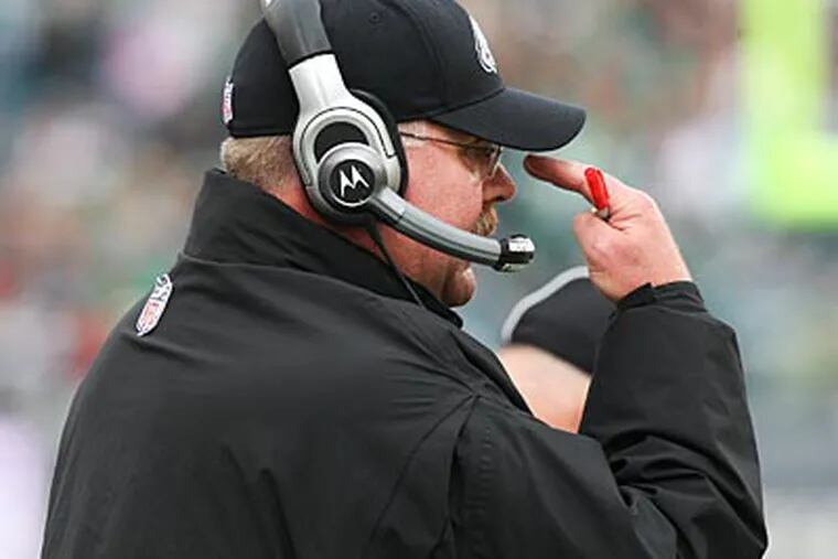 Andy Reid and the Eagles lost their third straight game on Sunday. (Steven M. Falk/Staff Photographer)