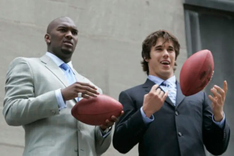 Two top possibilities to go No. 1 in the NFL draft are quarterbacks JaMarcus Russell (left) of LSU and Brady Quinn of Notre Dame.