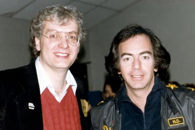 Mr. D'Errico (left) poses with fellow singer/songwriter Neil Diamond. They two artists collaborated early in their careers while they lived in New York.