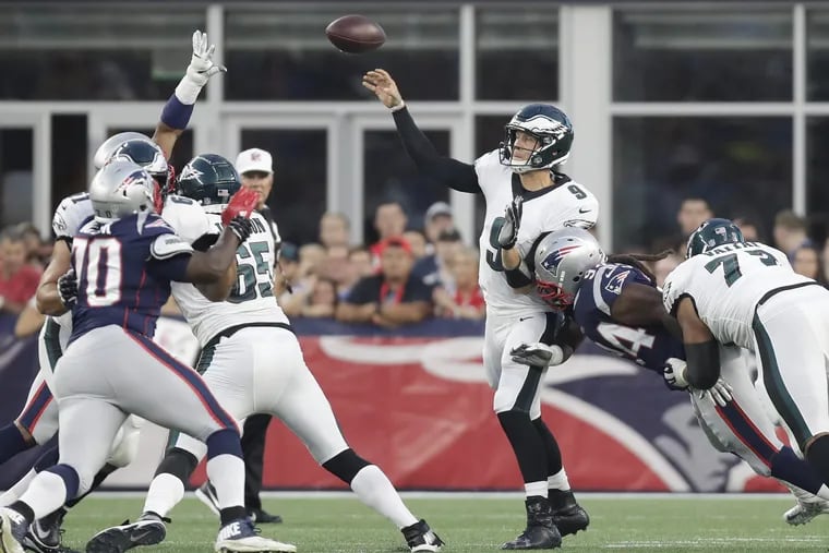 Eagles quarterback Nick Foles struggled against the Patriots on Thursday.