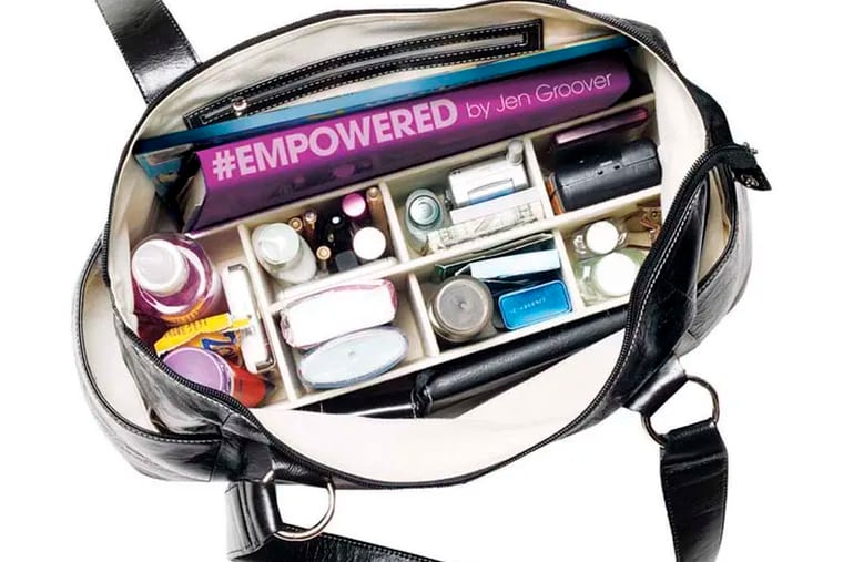 the Butler Bag handbag.
the worlds 1st compartmentalized handbag

inside the handbag is Jen Groovers book #empowered