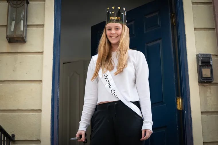 On Tuesday afternoon, William Penn Charter senior Anne Flemming wears a crown and sash from a "prom in a box" she and other seniors at the school received as part of a promotion for the March 13 prom episodes of some ABC sitcoms, including "The Goldbergs" and its spin-off, "Schooled," whose fictional school, William Penn Academy, is based on Penn Charter.