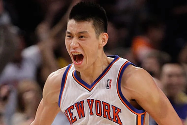 Jeremy Lin's popularity on social media has exploded since his debut with the Knicks. (Frank Franklin II/AP)