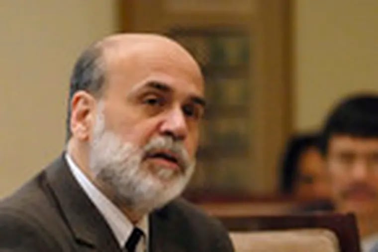 Fed chief Ben S. Bernanke at a meeting yesterday in which the board voted unanimously for rules cracking down on unscrupulous mortgage-lending practices.