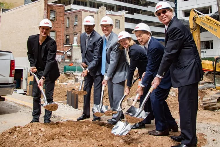 Ground is broken on the Pod Philly micro-hotel, with (left to right) Defined Hospitality partner Greg Root; Philadelphia Commerce Director Harold T. Epps; Parkway president Robert Zuritsky; Parkway executive vice president Anna Boni; Modus Hotels Chairman Conrad Cafritz; and Parkway chief executive Joseph Zuritsky.