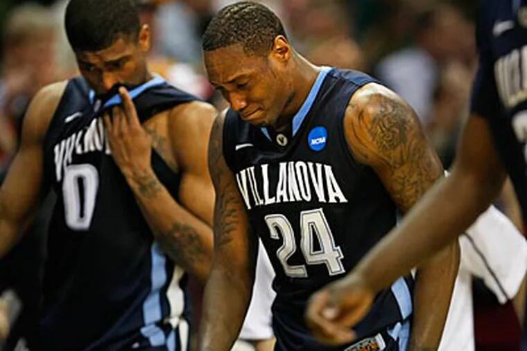 An emotional Corey Stokes walks off the court after Villanova lost to George Mason. (Ron Cortes/Staff Photographer)