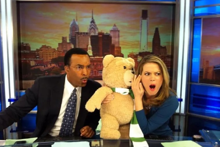 Ukee Washington with co-anchor Erika von Tiehl and guest “Ted” on their morning show. Ukee’s moving to nights, replacing Chris May. (FILE PHOTO)