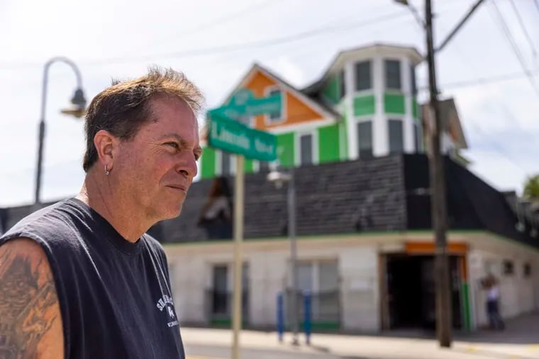 Tom Gerace, 59, owner of Shamrock, stands outside of the Shamrock as it's being torn apart inside to clear way when moving the Victorian house above it on Friday, June 25, 2021. “It’s depressing and we put a lot of work into it,” Gerace said. “Stuff happens and I did what was best for me at some point. If I opened back up I would lose my liquor license.”