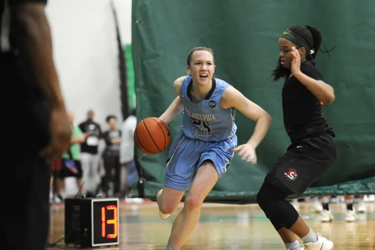 Maddie Burke, a Philadelphia Belles travel team player and Central Bucks West freshman, moves the ball at the Boo Williams Nike Invitational in Hampton, Va. Burke and her teammates are already drawing attention from college recruiters.