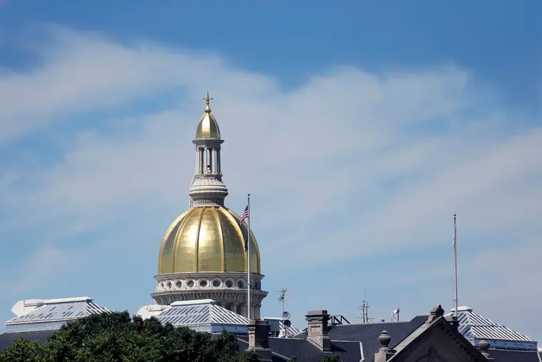 The Capital dome is seen at the New Jersey Statehouse. New Jersey Republicans are seizing on recent state attorney general lawsuits against school districts aimed at stopping them from outing transgender students' to their parents and stoking skepticism toward offshore wind turbines as issues in this year's election.
