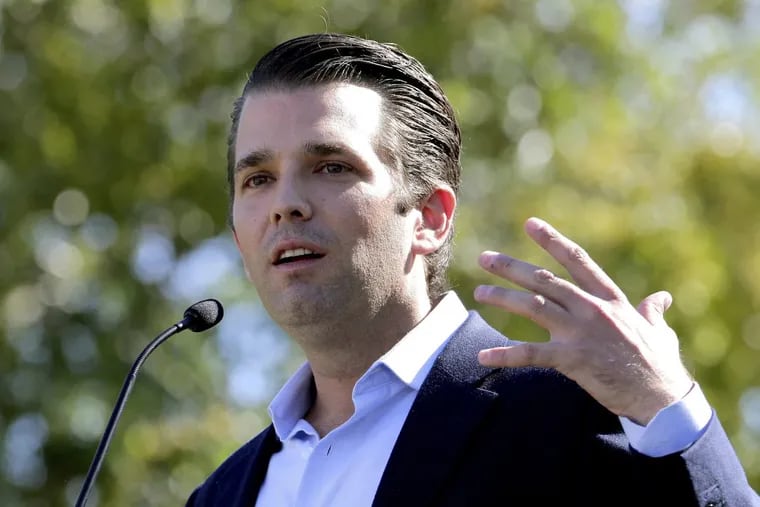 Donald Trump Jr. campaigns for his father Republican presidential candidate Donald Trump Friday, Nov. 4, 2016, in Gilbert, Ariz.