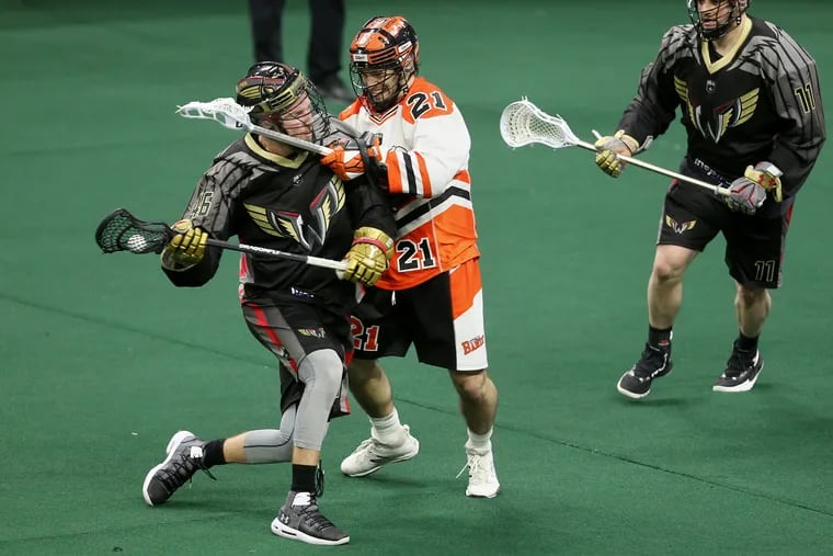 The Wings' Kiel Matisz (46) tries to maneuver around the Bandits' Justin Martin (21) in a 2018 game.