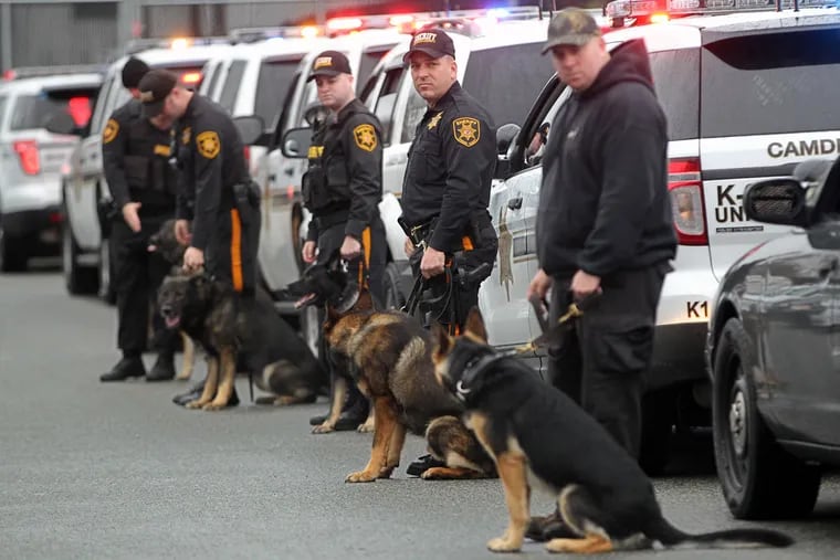 K-9 units from other South Jersey law enforcement agencies line up to pay their respects in the Camden County Police headquarters parking lot.