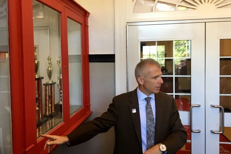 Rancocas Valley Regional High School District Superintendent Chris Heilig stands inside of an entrance vestibule at Rancocas Valley Regional High School that he hopes a grant from the county will enable to be updated with more security.