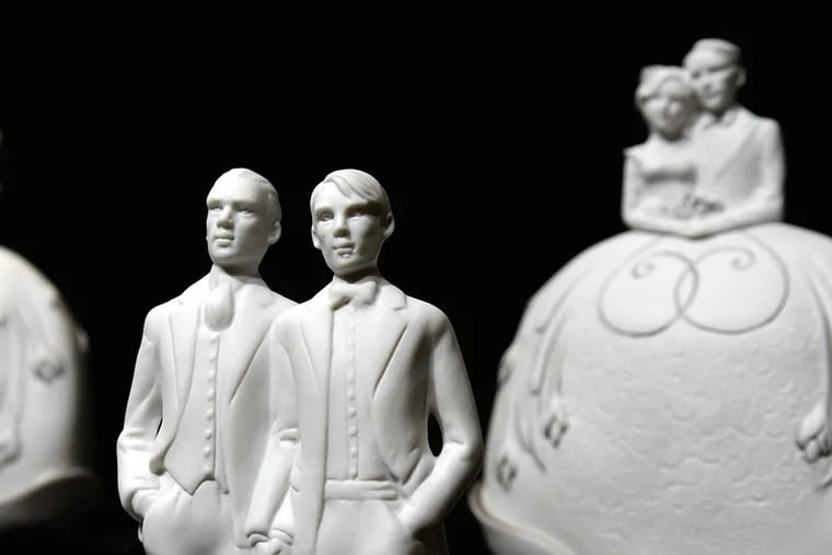 Wedding cake toppers for same-sex couples, who can take advantage of several estate- planning moves. TOM GRALISH / Staff Photographer