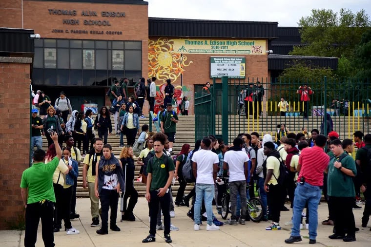 Students spill out of Thomas A. Edison High School at the end of the school day. Students who swipe their identification cards in the morning are considered present for the whole day — even when they cut class.
