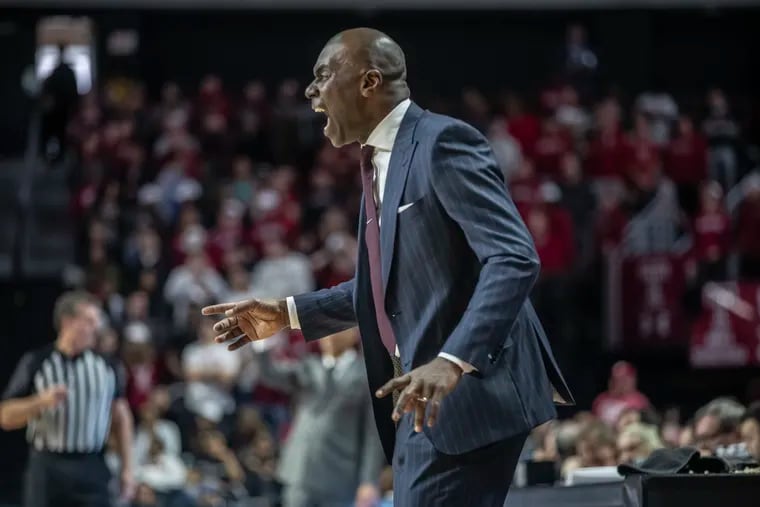 Temple head Coach Aaron McKie yells instructions to his players in the second half of the game against Villanova at the Liacouras Center on Feb 16.  Villanova won 76-56. .