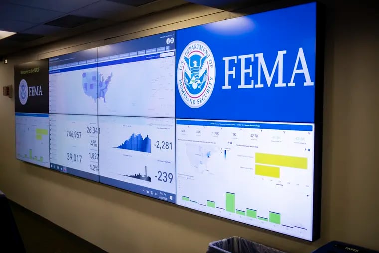 A video screen with data about the coronavirus pandemic at the Federal Emergency Management Agency headquarters on April 20.