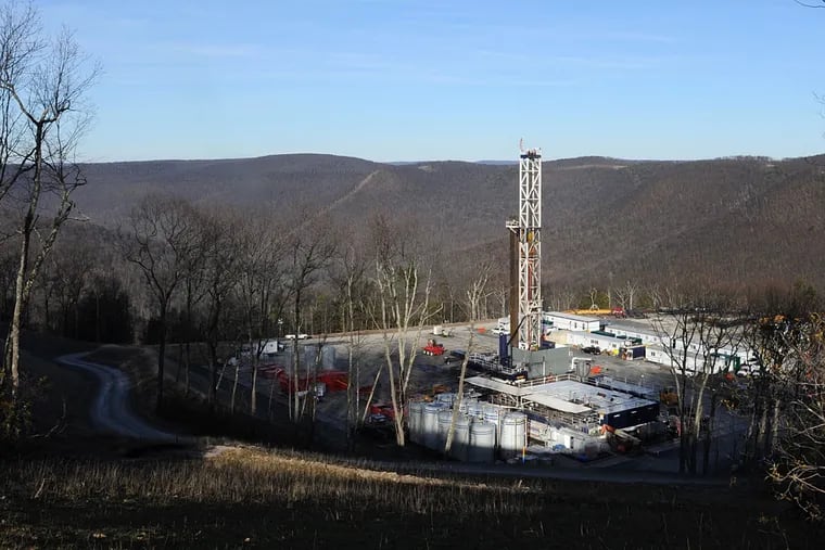 A Seneca Resources well site in Loyalsock State Forest in Lycoming County still produces gas, but the National Fuel Gas Co. subsidiary is curbing drilling plans. It also will delay the completion of a pipeline from Pennsylvania to western New York to 2017.