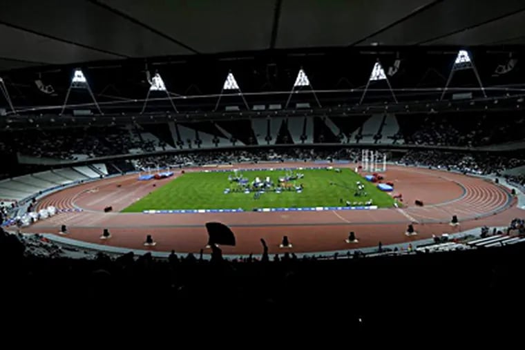 The main Olympic Stadium in London, where the 2012 Olympics open July 27. Comcast&rsquo;s NBC Sports division will broadcast the games; Aramark will provide the food. MATT DUNHAM / Associated Press