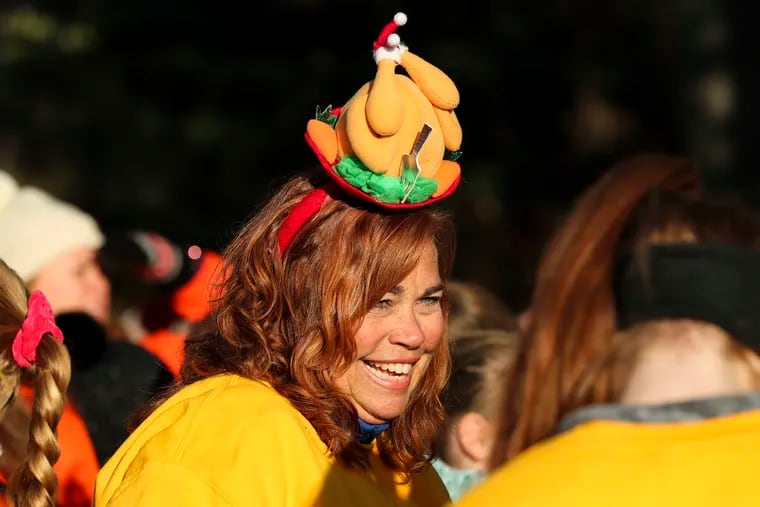 Linda Turk of Mullica Hill wearing a turkey headband before the 6ABC Dunkin' Thanksgiving Day Parade last year.