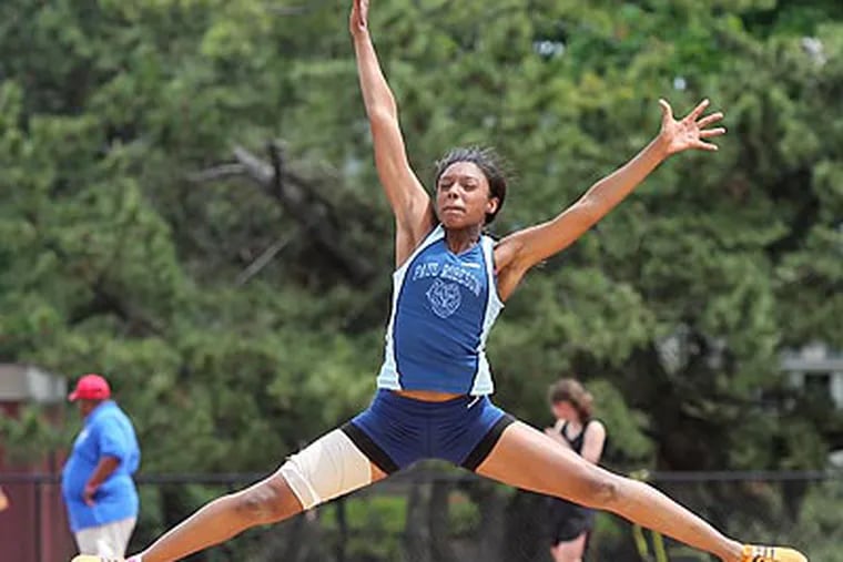 Shalaya Sidney of Paul Robeson won the Girls AA District 12 Long Jump Championship. (Charles Fox/Staff Photographer)