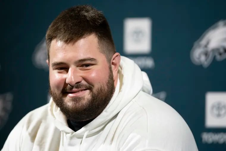 Eagles guard Landon Dickerson speaks with reporters at the NovaCare Complex in South Philadelphia, Pa. on Tuesday, March 12, 2024. The Eagles agreed to terms with Dickerson on a four-year contract extension that is worth up to $87 million, a deal that makes him the highest-paid guard in the NFL.