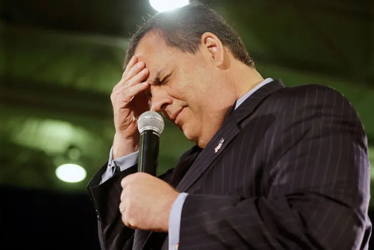 Gov. Christie winces after he got the day of the week wrong during his town-hall meeting. He said it was Wednesday. He was headed to Boston later in the day for a fund-raiser. (AP)