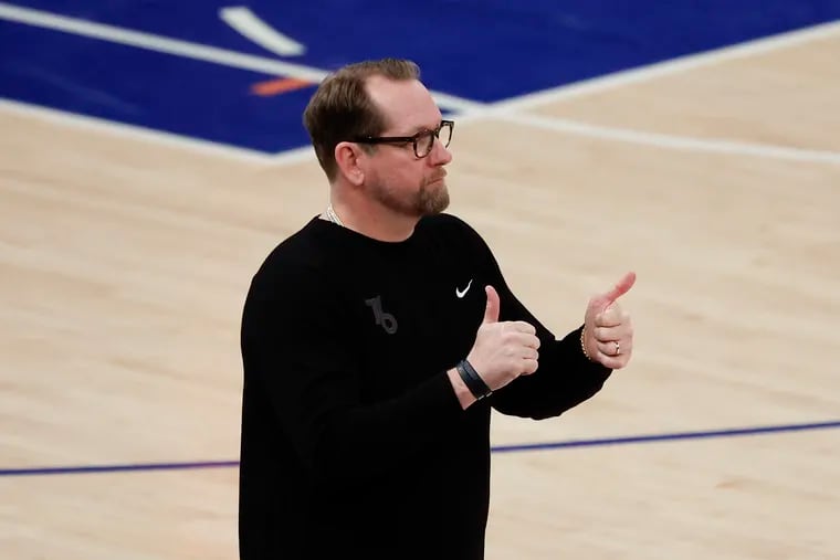 Sixers head coach Nick Nurse raises his thumbs against the New York Knicks during Game 1 of the Eastern Conference playoffs at Madison Square Garden in New York on Saturday, April 20, 2024.