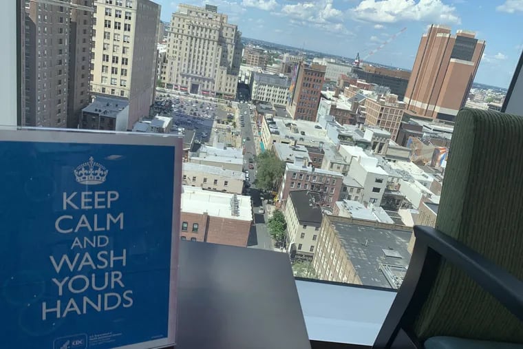 This sign in a Center City medical-office-tower waiting room urges calm nerves and clean hands as the region attempts to fully enter GREEN re-opening phase amid the coronavirus pandemic on Monday, June 29, 2020.