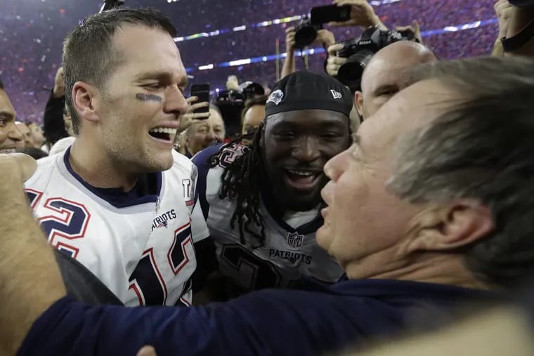 The scandals surround the New England Patriots, Tom Brady (left), and Bill Belichick have turned the Pats from America’s darlings to villains.