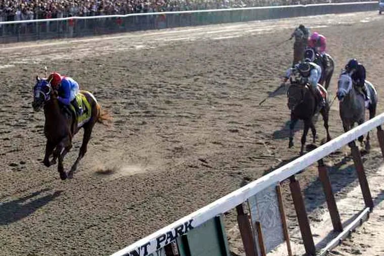 Kent Desormeaux rides Summer Bird to victory in the 141st running of the Belmont Stakes. Calvin Borel and Mine That Bird (second from right) finished third.