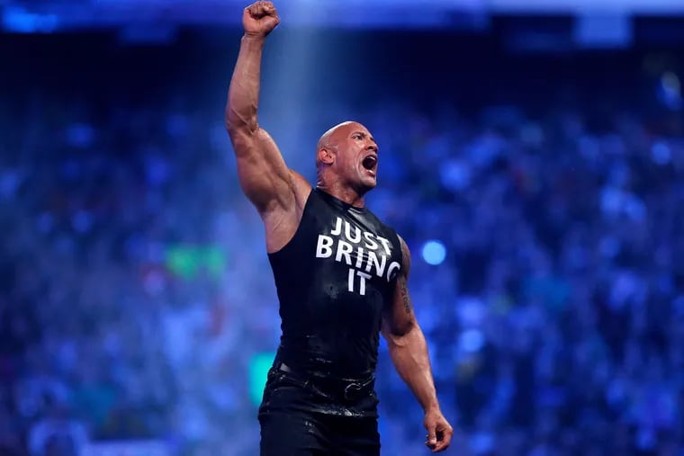Dwayne "The Rock" Johnson, seen here during WrestleMania XXX in 2014, will be back in the ring for WrestleMania XL in Philadelphia.